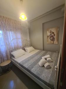 Postel nebo postele na pokoji v ubytování Makis Apartments Touzla