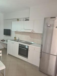 Kuchyň nebo kuchyňský kout v ubytování Makis Apartments Touzla