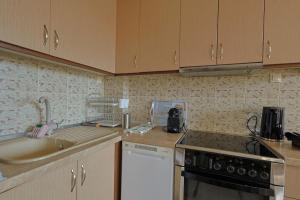 Kuchyň nebo kuchyňský kout v ubytování Zeusplace Leptokarya Seaside Apartment