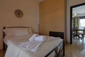Postel nebo postele na pokoji v ubytování Zeusplace Leptokarya Seaside Apartment