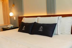 Posteľ alebo postele v izbe v ubytovaní LC Hoteles Piura