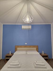 Postel nebo postele na pokoji v ubytování Villa dello Sparviero