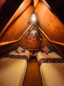 Postel nebo postele na pokoji v ubytování SORAYPAMPA - Cabañas Andinas Mamá Andrea Eco Lodge