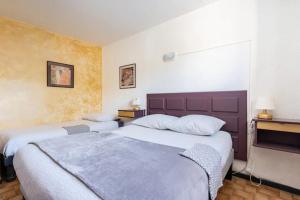 Ένα ή περισσότερα κρεβάτια σε δωμάτιο στο La Dame de cœur 05