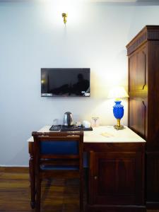 TV a/nebo společenská místnost v ubytování Chitawa Haveli jaIpur