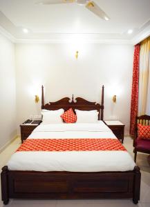 Postel nebo postele na pokoji v ubytování Chitawa Haveli jaIpur
