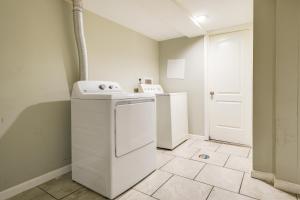 a laundry room with a washer and dryer at Baltimore Vacation Rental - Near JHU and Art Museum! in Baltimore +17 photos