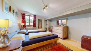 Posteľ alebo postele v izbe v ubytovaní Ferienhaus Chalet Kitzalp