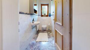 Kúpeľňa v ubytovaní Ferienhaus Chalet Kitzalp