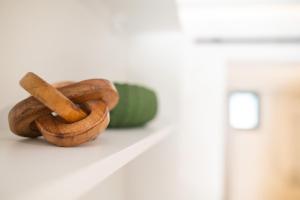 a pile of cinnamon sticks sitting on a counter at Perla Studio in Kos Town +58 photos