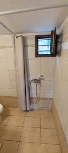Kúpeľňa v ubytovaní dimitris' villas - villa 1