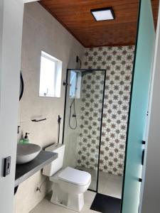 Koupelna v ubytování Jardim dos Milagres Suites 2