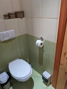 Vonios kambarys apgyvendinimo įstaigoje Roubenka