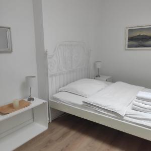 En eller flere senge i et værelse på City Motel