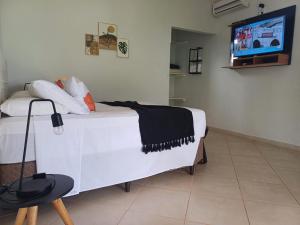 Un televizor și/sau centru de divertisment la Hotel Fazenda em Brotas - HFR