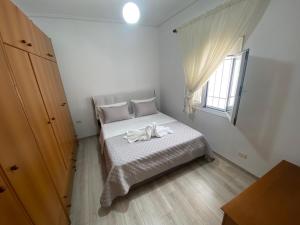 Postel nebo postele na pokoji v ubytování PatZOO Apartments