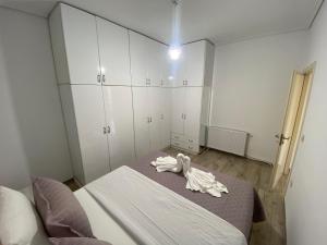 Postel nebo postele na pokoji v ubytování PatZOO Apartments