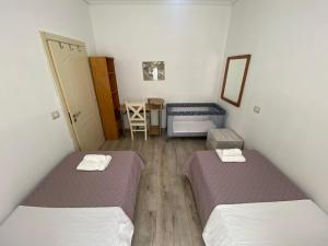 Postel nebo postele na pokoji v ubytování PatZOO Apartments