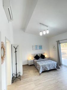 Ένα ή περισσότερα κρεβάτια σε δωμάτιο στο Casita Alisha, para descansar +45 φωτογραφίες