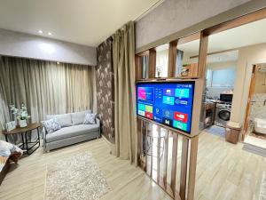 Μια τηλεόραση ή/και κέντρο ψυχαγωγίας στο Luxury Studio House Suite 1200-6