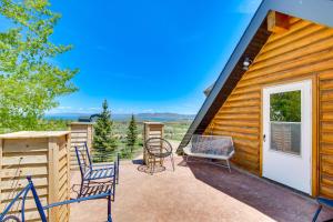 a patio with chairs and a house at Garden City Cabin about 6 Mi to Bear Lake State Park! in Garden City