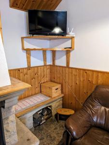 TV a/nebo společenská místnost v ubytování apartmán v pensionu U Holzäpfelů