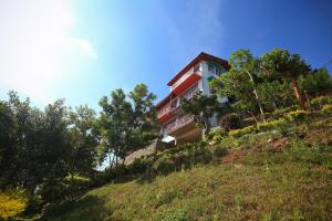 a building on the side of a hill at RedHill Kandy in Kandy