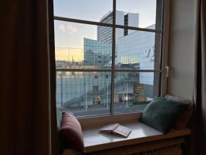 a window with a view of a city skyline at Vonn Apartment in Tallinn City Centre in Tallinn