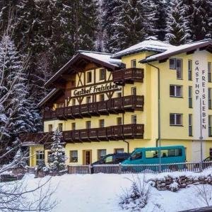 "Quality Hosts Arlberg" Hotel-Gasthof Freisleben om vinteren