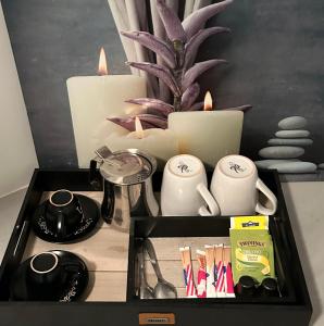 Tiện nghi pha trà/cà phê tại Appartement jacuzzi maison spa