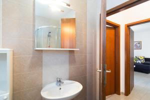 Koupelna v ubytování Apartmani Pina
