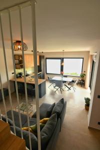 a living room with a couch and a table at Casa Miele in Omiš