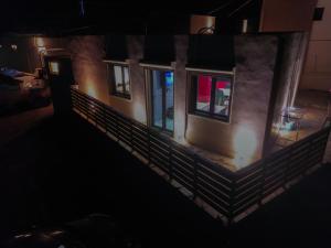 a view of a building at night with lights at Elafonisi Paradise with Parking, WiFi, - Walking Distance to the Beach in Elafonisi