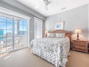Postel nebo postele na pokoji v ubytování Family Tides Carolina Beach
