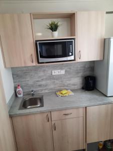 Kuchyňa alebo kuchynka v ubytovaní Apartmán u Bouře