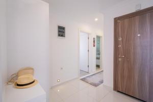 a hat sitting on a counter next to a door at Blue View Suites Kaş in Kas +83 photos