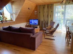 Et opholdsområde på Apartament Lux Czerwone Korale