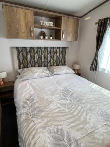 Postel nebo postele na pokoji v ubytování Visma Caravan