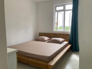 Postel nebo postele na pokoji v ubytování Duplex Résidence Cardano-jardin privé