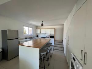 Kuchyň nebo kuchyňský kout v ubytování Duplex Résidence Cardano-jardin privé