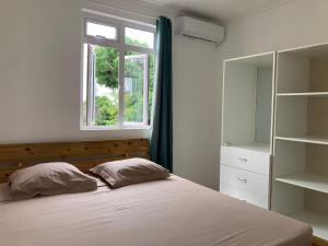 Postel nebo postele na pokoji v ubytování Duplex Résidence Cardano-jardin privé