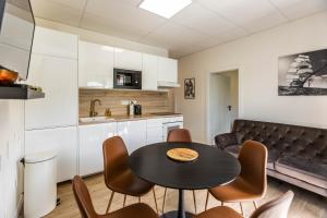 Kuchyňa alebo kuchynka v ubytovaní Stylish Apartment With Free Parking