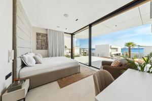 Voodi või voodid majutusasutuse LIOQA Resort toas
