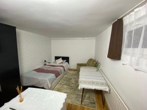Postel nebo postele na pokoji v ubytování Casa Ardeleana