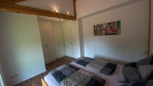 Postel nebo postele na pokoji v ubytování Ferienwohnung Scheierlweg