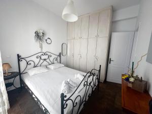 Postel nebo postele na pokoji v ubytování Portolos Apartments - Filiatro + 5 fotografií