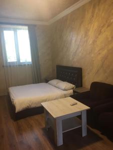 Letto o letti in una camera di Baron Hotel