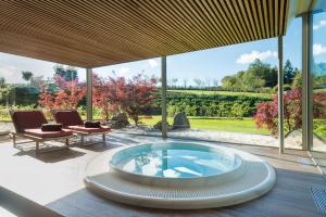 Bazén v ubytování Hotel des Bains & Wellness nebo v jeho okolí