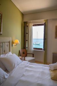 Postel nebo postele na pokoji v ubytování La Boheme Hotel