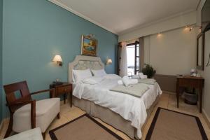 Postel nebo postele na pokoji v ubytování La Boheme Hotel